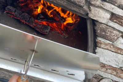 Recette rôti de porc et légumes au four à bois